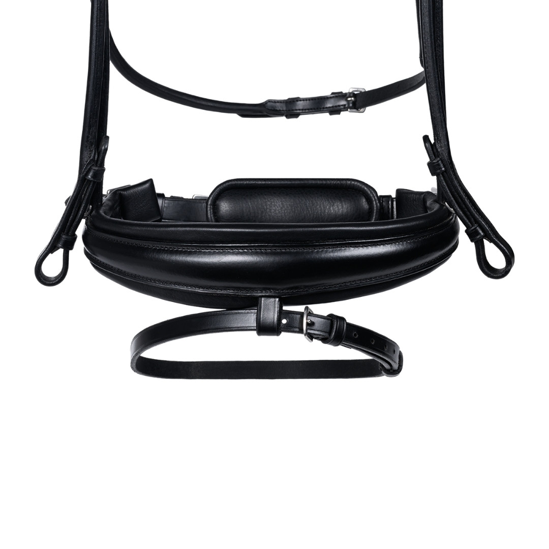 Small black leather crossbody bag with thin strap and padded front pocket on white background