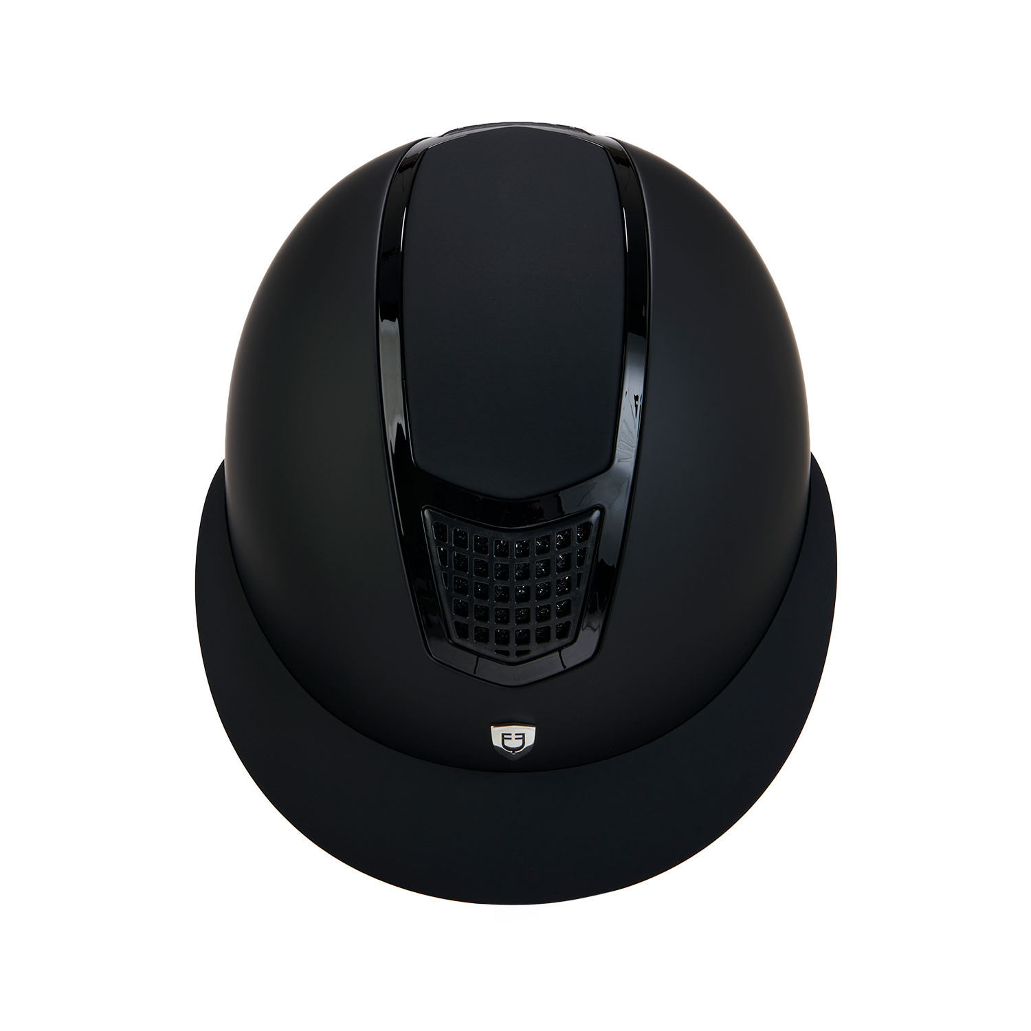 Top-down view of a matte black helmet with a front ventilation grille and small shield badge.