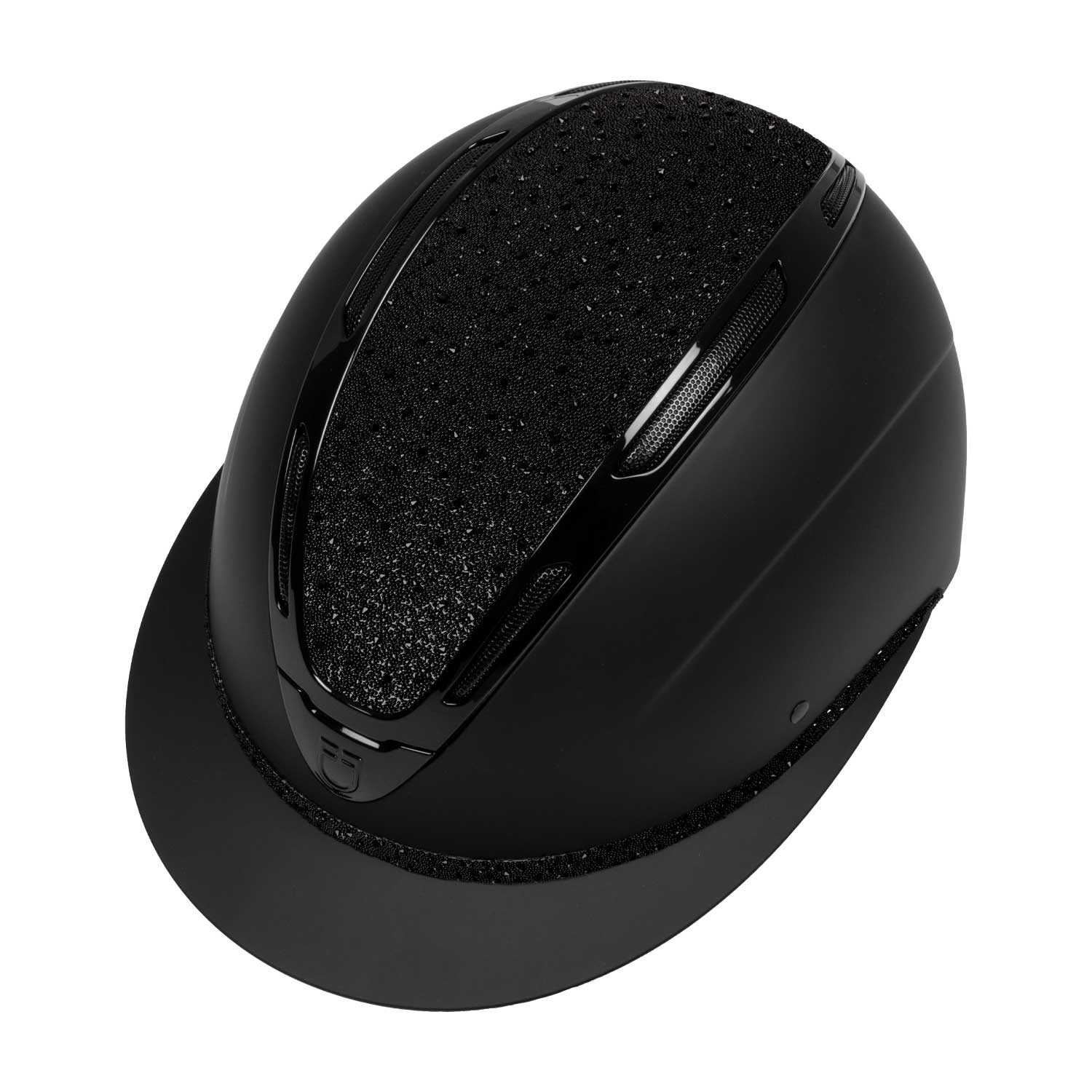Close-up of a black wireless computer mouse resting on a circular base, showing textured top and side buttons from a diagonal angle.